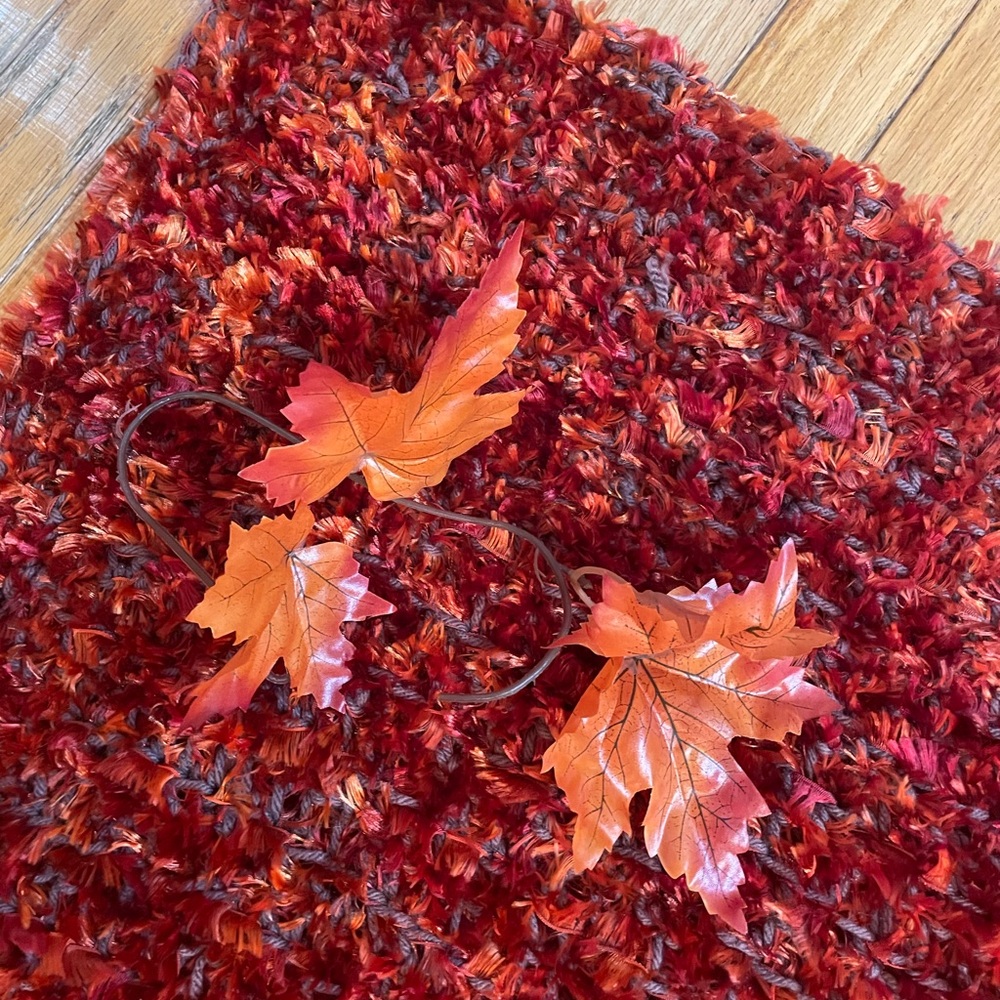 Handcrafted blanket- and needlepoint lumbar pillow - beautiful knitted artistry